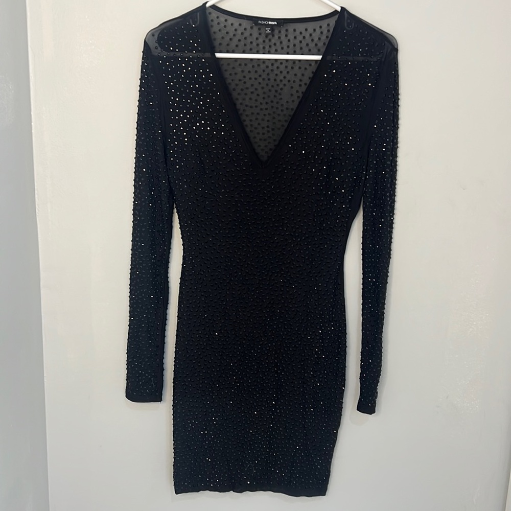 Sparkly Rhinestone black dress. Huggs body. Stretchy material. Never worn